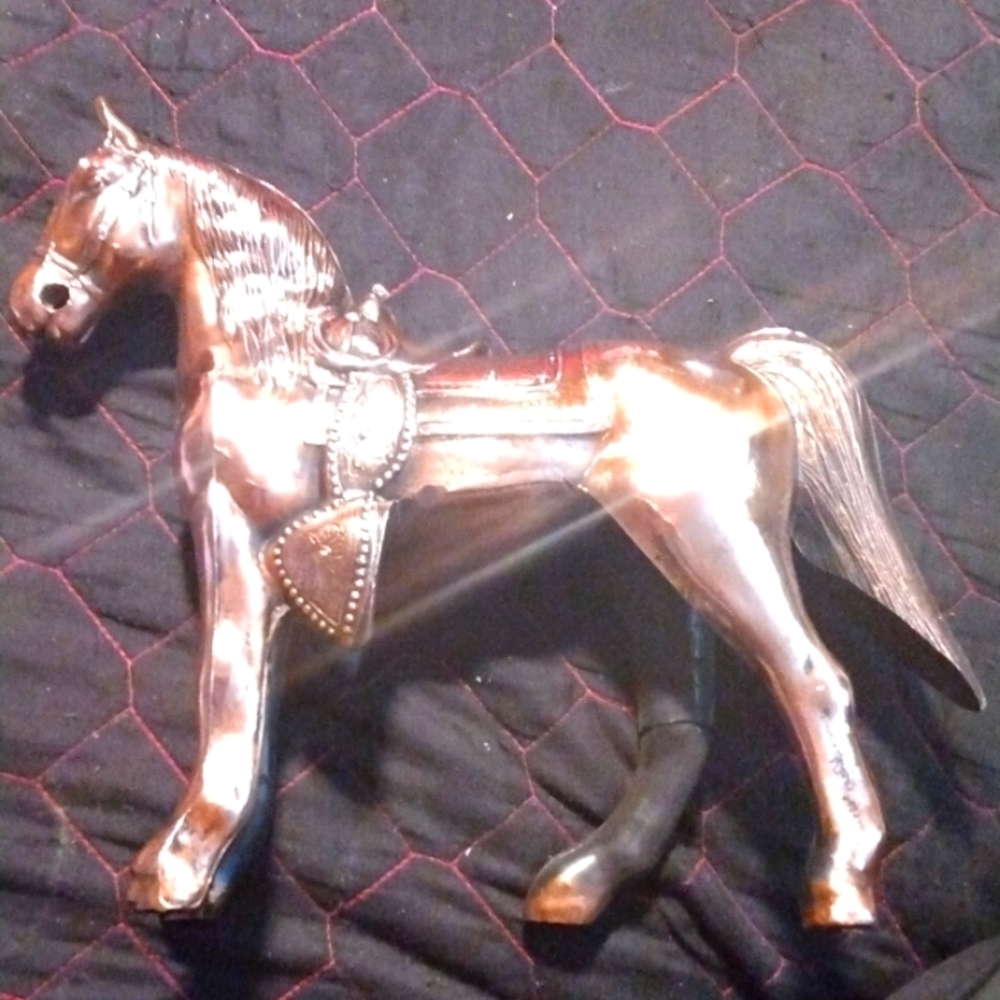One brass horse